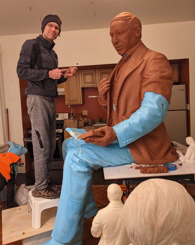 Ethan Houser modeling laser enlargement of Benito Juarez monument